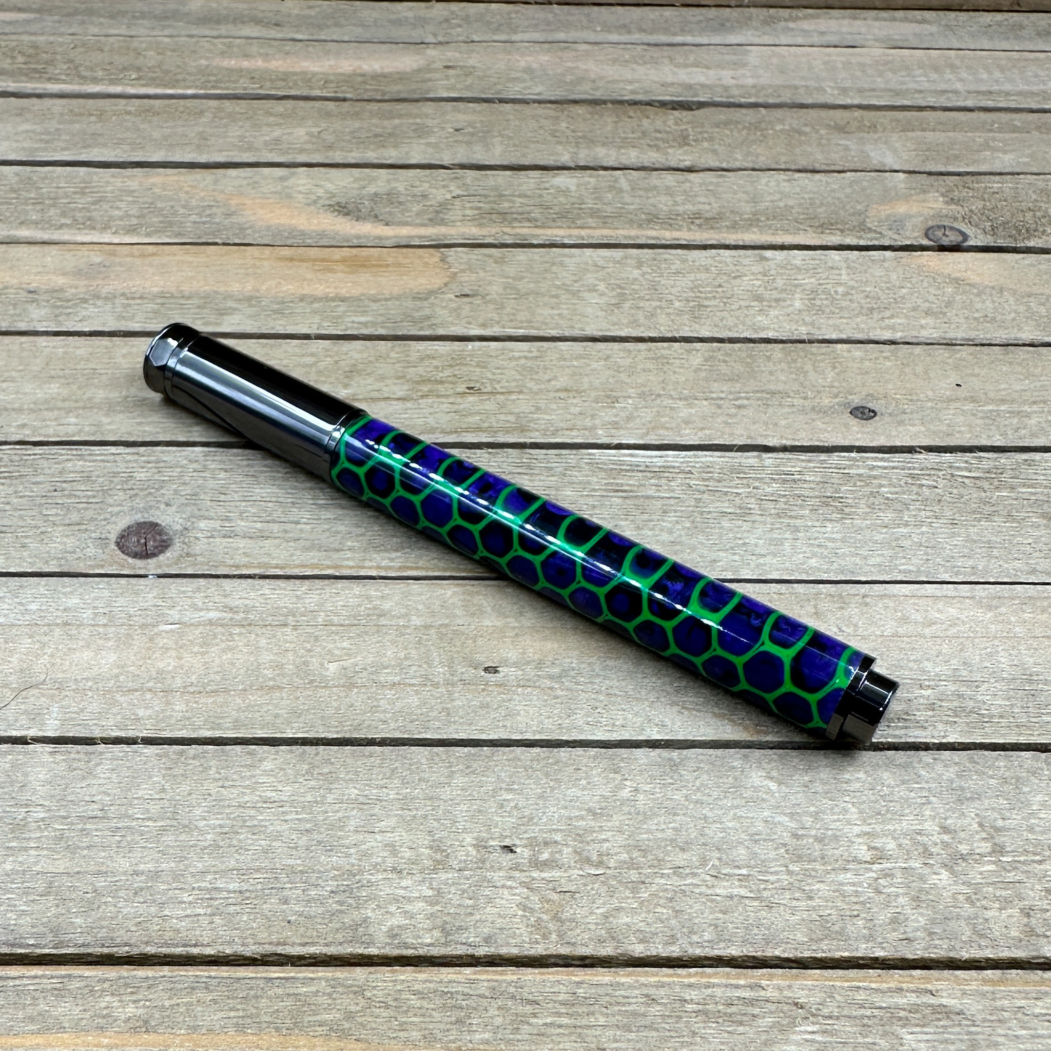 Joker inspired rollerball pen with gunmetal hardware Joker inspired rollerball pen with gunmetal hardware