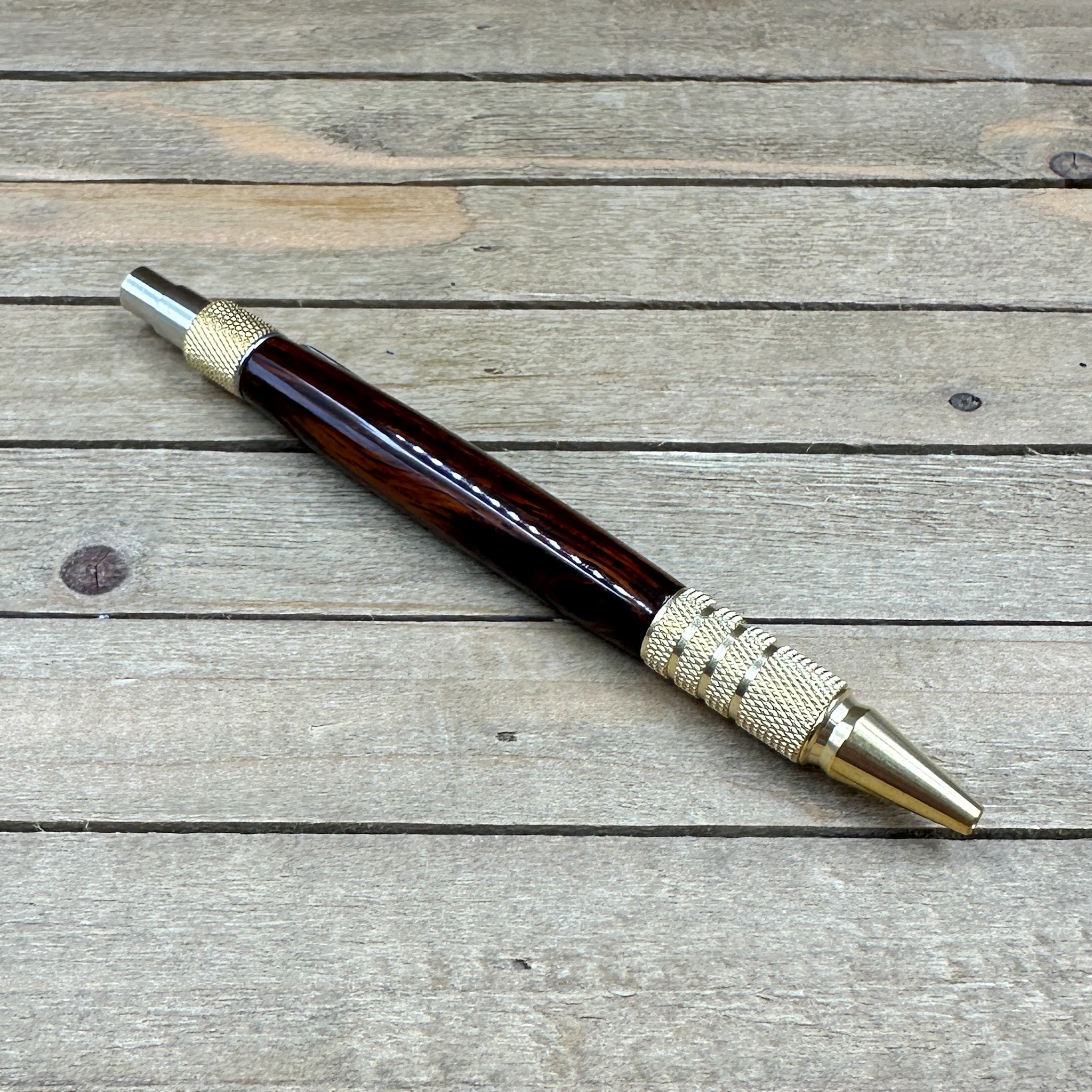 Exotic dark Mexican Cocobolo wood and brass click pen Exotic dark Mexican Cocobolo wood and brass click pen